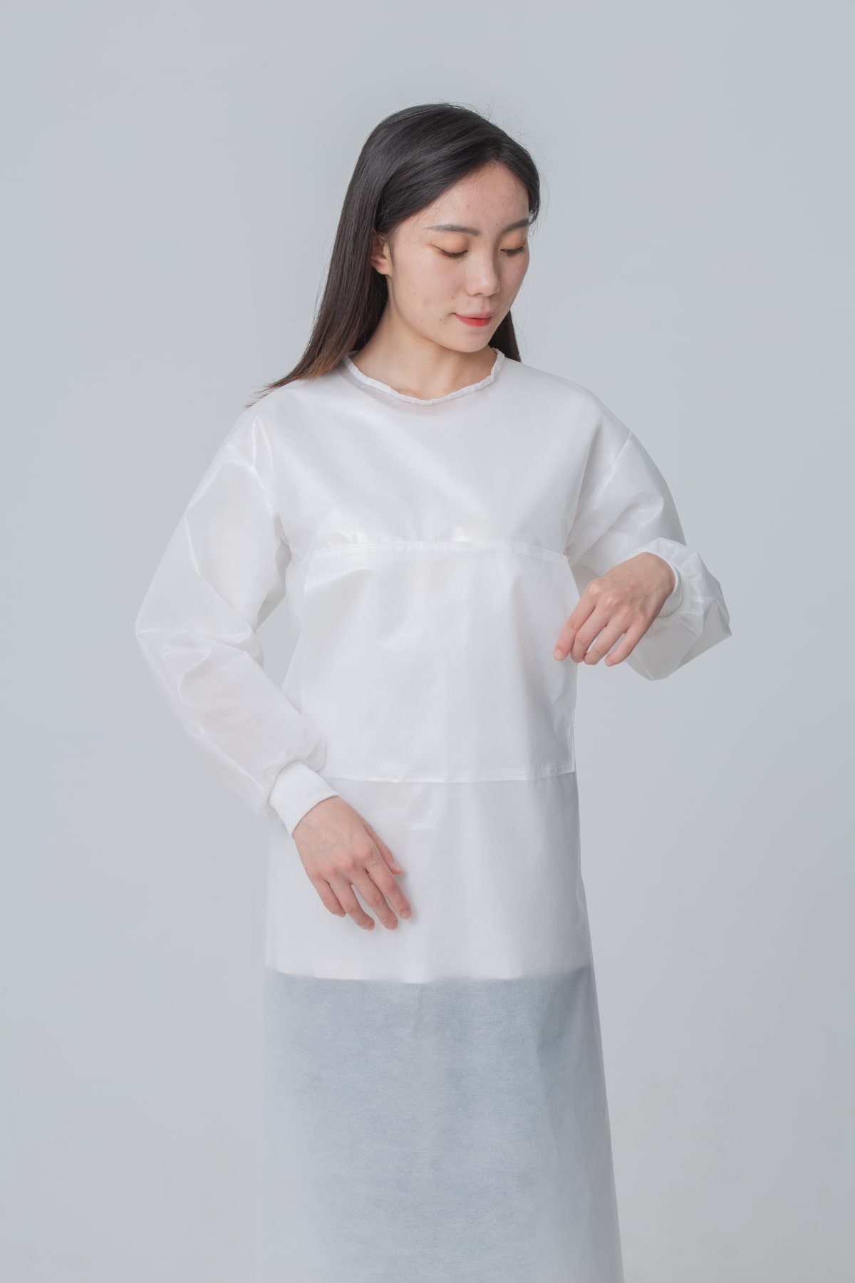 8覆膜无纺布隔离衣左侧袋子-min